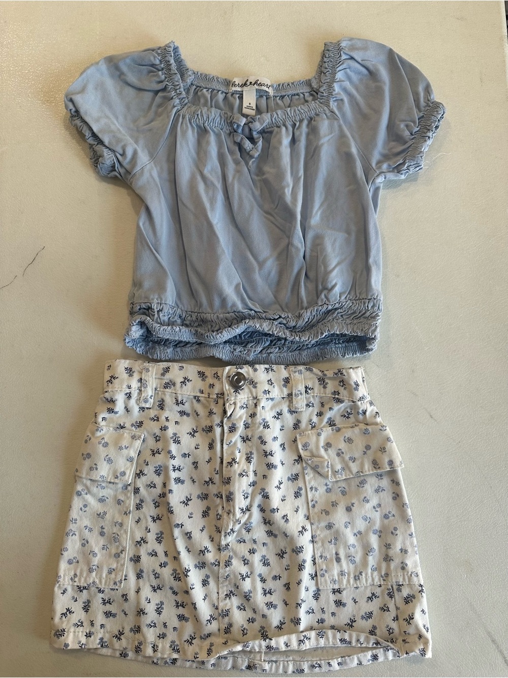 Derek Heart White Mini Skirt with Blue Floral Print, matching blue top